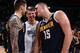 DENVER, CO - DECEMBER 18: Luka Doncic #77 of the Dallas Mavericks talks with Juan Hernangomez #41 and Nikola Jokic #15 of the Denver Nuggets on December 18, 2018 at the Pepsi Center in Denver, Colorado. NOTE TO USER: User expressly acknowledges and agree