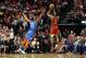 HOUSTON, TX - FEBRUARY 09: James Harden #13 of the Houston Rockets takes a three point shot defended by Paul George #13 of the Oklahoma City Thunder in the second half at Toyota Center on February 9, 2019 in Houston, Texas. NOTE TO USER: User expressly