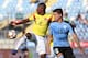 Colombia's Carlos Cuesta (L) vies for the ball with Uruguay's Darwin Nunez (R) during their South American U-20 football match at El Teniente stadium in Rancagua, Chile on February 10, 2019. (Photo by CLAUDIO REYES / AFP) (Photo credit should read