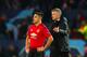 MANCHESTER, ENGLAND - FEBRUARY 12: Manchester United Head Coach / Manager Ole Gunnar Solskjaer consoles Alexis Sanchez of Manchester United at the end of the UEFA Champions League Round of 16 First Leg match between Manchester United and Paris Saint-Ger