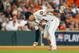 HOUSTON, TX - OCTOBER 16: Alex Bregman #2 of the Houston Astros fields a ball in the seventh inning against the Boston Red Sox during Game Three of the American League Championship Series at Minute Maid Park on October 16, 2018 in Houston, Texas. (Photo