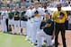 Bruce Maxwell, seen here kneeling before an A's-Rangers game late in the 2017 season, is still the only player in Major League Baseball to have kneeled while protesting against social injustice.