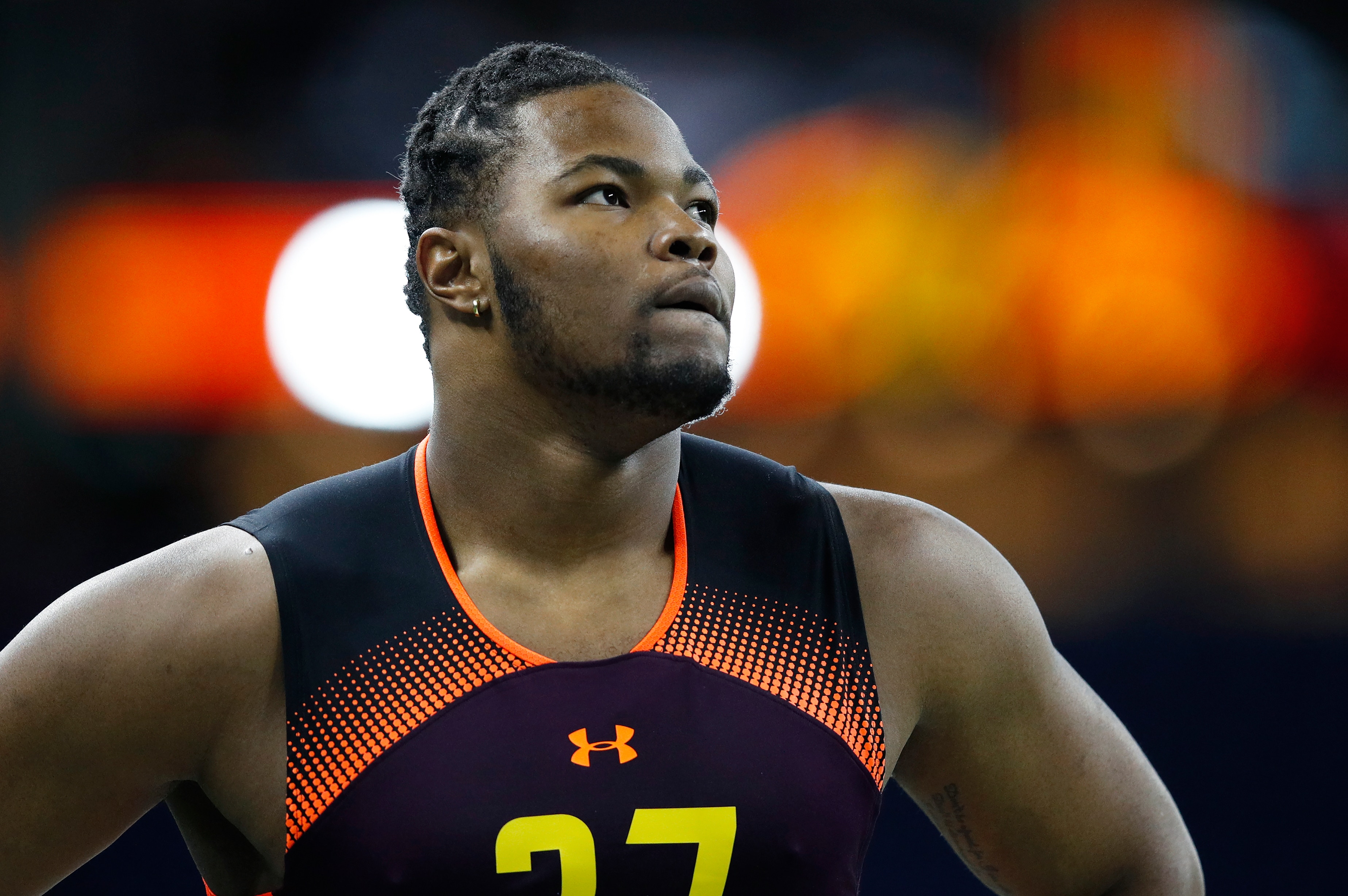 INDIANAPOLIS, IN - MARCH 03: Defensive lineman Rashan Gary of Michigan checks his time after running the 40-yard dash during day four of the NFL Combine at Lucas Oil Stadium on March 3, 2019 in Indianapolis, Indiana. (Photo by Joe Robbins/Getty Images)