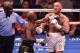 LAS VEGAS, NV - AUGUST 26: (L-R) Floyd Mayweather Jr. pushes Conor McGregor after the bell rings in their super welterweight boxing match at T-Mobile Arena on August 26, 2017 in Las Vegas, Nevada. Mayweather won by 10th-round TKO. (Photo by Jeff Bottari/