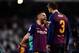 Barcelona's Spanish defender Jordi Alba (L) and Barcelona's Spanish defender Gerard Pique celebrate their win at the end of the Spanish league football match between Real Madrid CF and FC Barcelona at the Santiago Bernabeu stadium in Madrid on March 2, 20