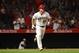ANAHEIM, CA - SEPTEMBER 28: Mike Trout #27 of the Los Angeles Angels of Anaheim watches his hit go for a two-run homerun during the third inning of the MLB game against the Oakland Athletics at Angel Stadium on September 28, 2018 in Anaheim, California.