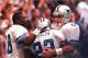 IRVING, : Dallas Cowboys quarterback Troy Aikman (R) and wide receiver Michael Irvin (L) congratulate Emmitt Smith (C) after he scored one of his three touchdowns during the NFC Championship Game in Irving, Texas against the Green Bay Packers 14 January.