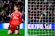 Real Madrid's Belgian goalkeeper Thibaut Courtois reacts as he concedes a fourth goal during the UEFA Champions League round of 16 second leg football match between Real Madrid CF and Ajax at the Santiago Bernabeu stadium in Madrid on March 5, 2019. (Phot