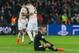 PARIS, FRANCE - MARCH 06: Marcus Rashford of Manchester United and Victor Lindeloef of Manchester United celebrate and Marco Verratti of Paris Saint-Germain sits on the gorund during the UEFA Champions League Round of 16 Second Leg match between Paris Sai
