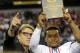Murray poses with former Texas governor Rick Perry after winning MVP in the state title game.