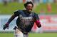 WEST PALM BEACH, FL - MARCH 13: Ronald Acuna Jr. #13 of the Atlanta Braves runs to third base for an RBI triple against the Washington Nationals during the third inning of a spring training baseball game at Fitteam Ballpark of the Palm Beaches on March 13