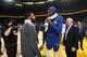 OAKLAND, CA - MARCH 5: Kyrie Irving #11 of the Boston Celtics speaks with Kevin Durant #35 of the Golden State Warriors after the game on March 5, 2019 at ORACLE Arena in Oakland, California. NOTE TO USER: User expressly acknowledges and agrees that, by