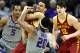 KANSAS CITY, MISSOURI - MARCH 15: Nick Weiler-Babb #1 of the Iowa State Cyclones controls the ball as Xavier Sneed #20 of the Kansas State Wildcats tries to wrestle it away during the semifinal game of the Big 12 Basketball Tournament at Sprint Center on