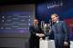 Juventus football club ambassador Pavel Nedved (R) shakes hands with Ajax director of football Marc Overmars next to results of the draw for the Champions league quarter-final and the competition's trophy, on March 15, 2019 in Nyon. (Photo by Fabrice COFF