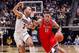 WEST LAFAYETTE, IN - DECEMBER 29: Kevin McClain #11 of the Belmont Bruins drives to the basket during the game against Carsen Edwards #3 of the Purdue Boilermakers at Mackey Arena on December 29, 2018 in West Lafayette, Indiana. (Photo by Michael Hickey/G