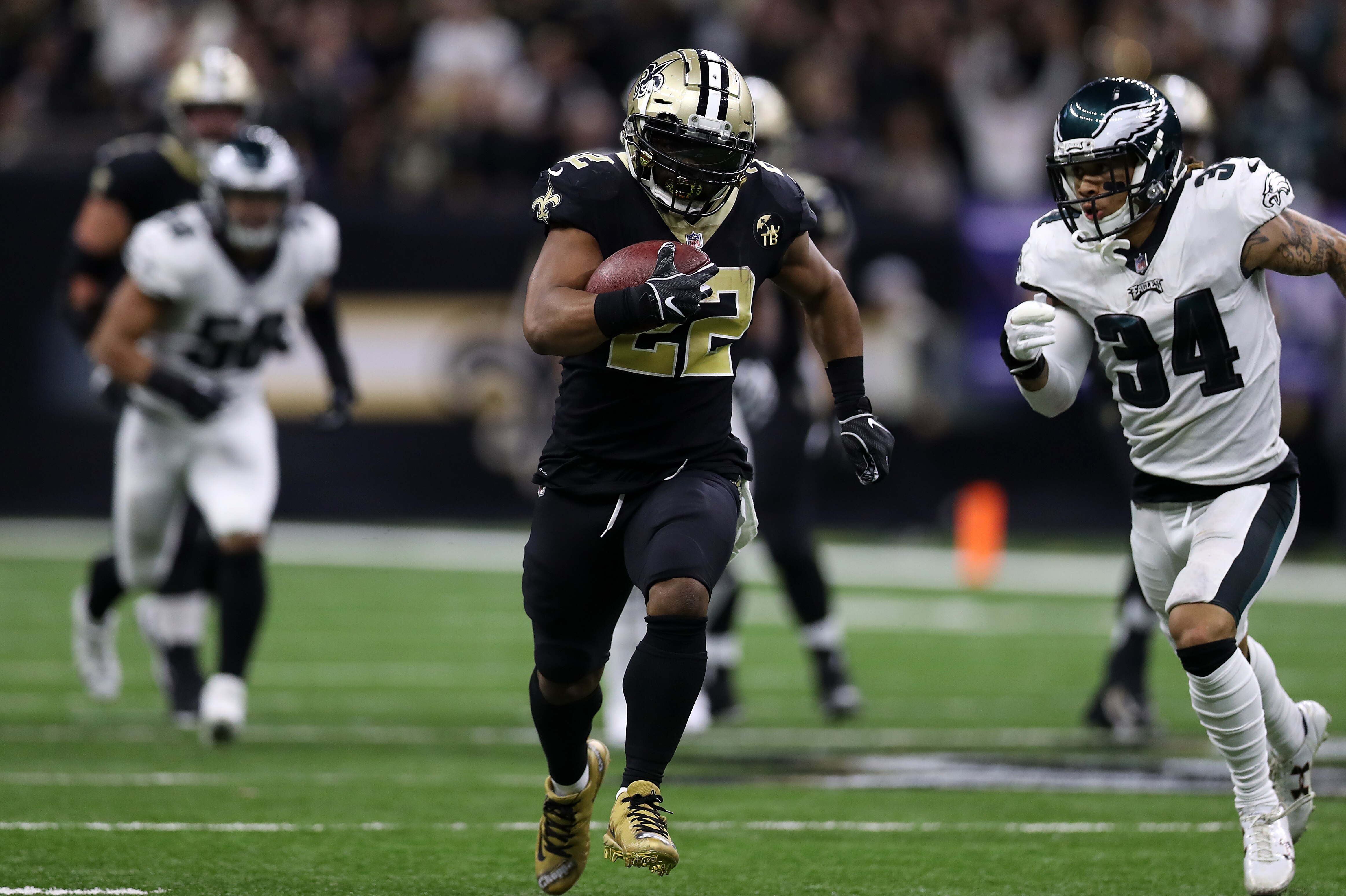 NEW ORLEANS, LOUISIANA - JANUARY 13: Mark Ingram #22 of the New Orleans Saints during the NFC Divisional Playoff at the Mercedes Benz Superdome on January 13, 2019 in New Orleans, Louisiana. (Photo by Chris Graythen/Getty Images)