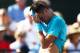INDIAN WELLS, CALIFORNIA - MARCH 05: Bernard Tomic of Australia shows his frustration during his three set defeat to Lukas Rosol of the Czech Republic in their second round qualifying match on Day 2 of the BNP Paribas Open at the Indian Wells Tennis Garde