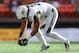HONOLULU, HI - DECEMBER 24: Jahlani Tavai #31 of the Hawai'I Rainbow Warriors picks up a Middle Tennessee fumble during the first quarter of the Hawaii Bowl at Aloha Stadium on December 24, 2016 in Honolulu, Hawaii. (Photo by Darryl Oumi/Getty Images)