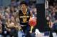HARTFORD, CONNECTICUT - MARCH 21: Ja Morant #12 of the Murray State Racers drives the ball down court during the first round game of the 2019 NCAA Men's Basketball Tournament against the Marquette Golden Eagles at XL Center on March 21, 2019 in Hartford,