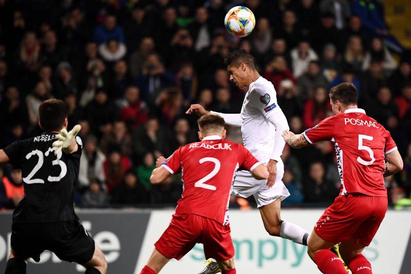 France's defender Raphael Varane (2ndR) scores a goal during the Euro 2020 qualifying football match between Moldova and France, on March 22, 2019 at Zimbru stadium in Chisinau. (Photo by FRANCK FIFE / AFP) (Photo credit should read FRANCK FIFE/AFP