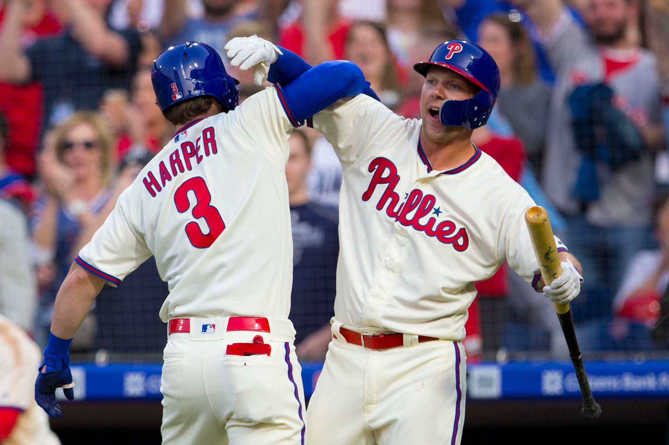 PHILADELPHIA, PA - MARCH 30: Bryce Harper #3 of the Philadelphia Phillies celebrates with Rhys Hoskins #17 after hitting a solo home run in the bottom of the seventh inning against the Atlanta Braves at Citizens Bank Park on March 30, 2019 in Philadelphia