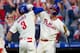 PHILADELPHIA, PA - MARCH 30: Bryce Harper #3 of the Philadelphia Phillies celebrates with Rhys Hoskins #17 after hitting a solo home run in the bottom of the seventh inning against the Atlanta Braves at Citizens Bank Park on March 30, 2019 in Philadelphia