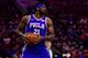 PHILADELPHIA, PA - MARCH 28: Joel Embiid #21 of the Philadelphia 76ers looks to pass during the first quarter at the Wells Fargo Center on March 28, 2019 in Philadelphia, Pennsylvania. The 76ers defeated the Nets 123-110. NOTE TO USER: User expressly ackn