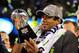 EAST RUTHERFORD, NJ - FEBRUARY 02: Quarterback Russell Wilson #3 of the Seattle Seahawks holding the Lombardi Trophy after they defeated the Denver Broncos in Super Bowl XLVIII on February 2, 2014 at MetLife Stadium in East Rutherford, New Jersey. The Se