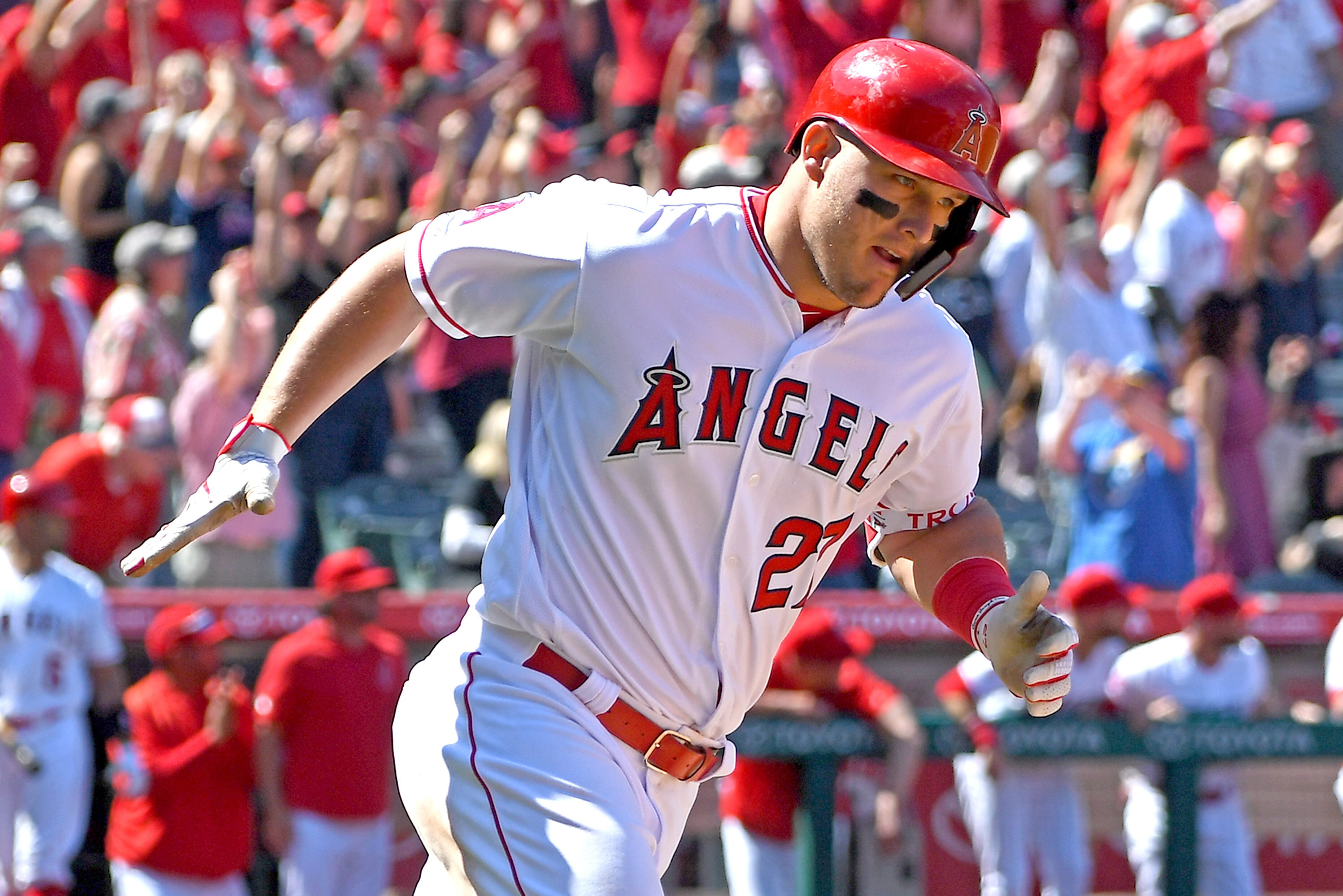 ANAHEIM, CA - APRIL 06: Mike Trout #27 of the Los Angeles Angels of Anaheim rounds the bases after hitting a grand slam home run in the fourth inning of the game against the Texas Rangers at Angel Stadium of Anaheim on April 6, 2019 in Anaheim, California