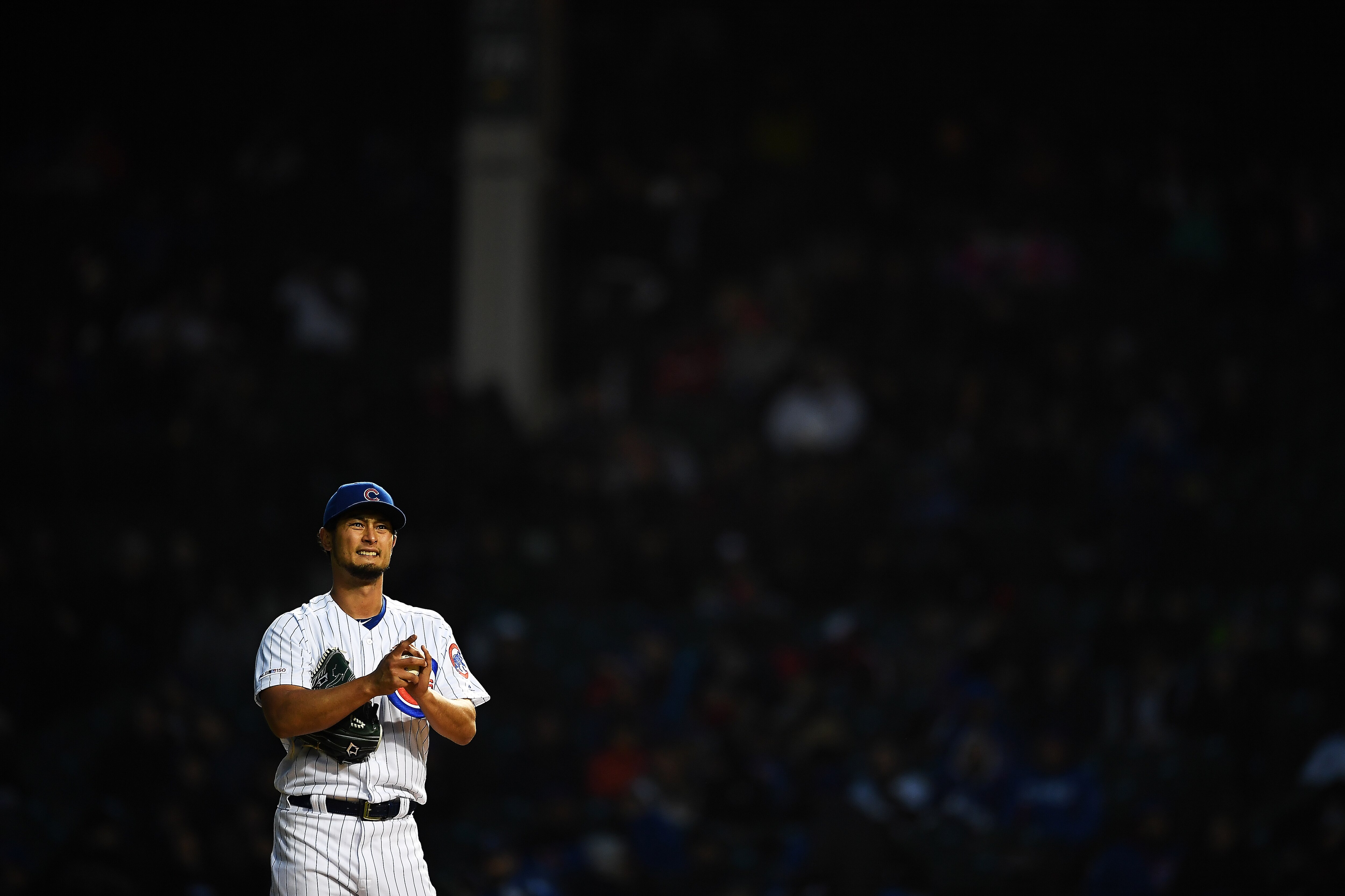 CHICAGO, ILLINOIS - APRIL 10: Yu Darvish #11 of the Chicago Cubs stands on the mound during a game against the Pittsburgh Pirates at Wrigley Field on April 10, 2019 in Chicago, Illinois. (Photo by Stacy Revere/Getty Images)