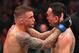 ATLANTA, GA - APRIL 13: (L-R) Dustin Poirier and Max Holloway embrace after finishing five rounds in their interim lightweight championship bout during the UFC 236 event at State Farm Arena on April 13, 2019 in Atlanta, Georgia. (Photo by Josh Hedges/Zuf