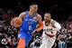 PORTLAND, OR - APRIL 14: Russell Westbrook #0 of the Oklahoma City Thunder drives to the basket on Damian Lillard #0 of the Portland Trail Blazers during the second half of the game at the Moda Center on April 14, 2019 in Portland, Oregon. The Blazers wo