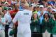 AUGUSTA, GEORGIA - APRIL 14: Tiger Woods (L) of the United States celebrates with caddie Joe LaCava (R) on the 18th green after winning during the final round of the Masters at Augusta National Golf Club on April 14, 2019 in Augusta, Georgia. (Photo by Da