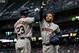 SEATTLE, WA - APRIL 13: Jose Altuve #27 of the Houston Astros is congratulated by Michael Brantley #23 of the Houston Astros after hitting a solo home run off of starting pitcher Felix Hernandez #34 of the Seattle Mariners during the fifth inning of a gam
