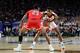 MINNEAPOLIS, MINNESOTA - APRIL 08: De'Andre Hunter #12 of the Virginia Cavaliers is defended by Jarrett Culver #23 of the Texas Tech Red Raiders in the second half during the 2019 NCAA men's Final Four National Championship game at U.S. Bank Stadium on A