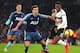 LONDON, ENGLAND - JANUARY 20: Harry Winks of Tottenham tackles Ryan Sessegnon of Fulham during the Premier League match between Fulham FC and Tottenham Hotspur at Craven Cottage on January 20, 2019 in London, United Kingdom. (Photo by Catherine Ivill/Get