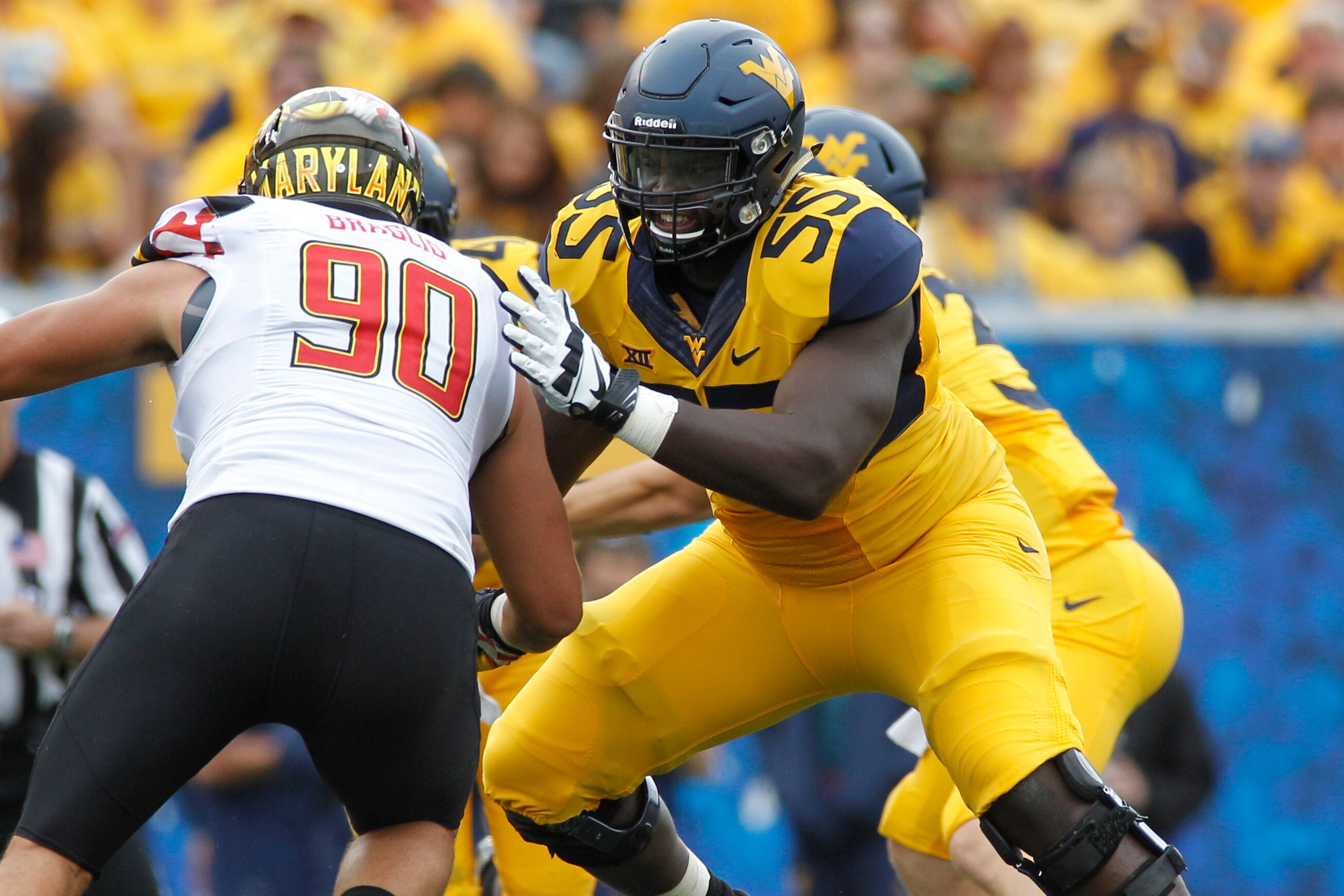 MORGANTOWN, WV - SEPTEMBER 26: Yodny Cajuste #55 of the West Virginia Mountaineers in action during the game against the Maryland Terrapins on September 26, 2015 at Mountaineer Field in Morgantown, West Virginia. (Photo by Justin K. Aller/Getty Images)