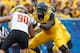 MORGANTOWN, WV - SEPTEMBER 26: Yodny Cajuste #55 of the West Virginia Mountaineers in action during the game against the Maryland Terrapins on September 26, 2015 at Mountaineer Field in Morgantown, West Virginia. (Photo by Justin K. Aller/Getty Images)