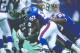 23 Dec 1995: Linebacker Corey Miller of the New York Giants makes a tackle during a game against the San Diego Chargers at Giants Stadium in East Rutherford, New Jersey. The Chargers won the game, 27-17. Mandatory Credit: Al Bello /Allsport