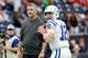 HOUSTON, TX - JANUARY 05: Head coach Frank Reich of the Indianapolis Colts watches as Andrew Luck #12 warms up before the game against the Houston Texans during the Wild Card Round at NRG Stadium on January 5, 2019 in Houston, Texas. (Photo by Tim Warne