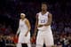 PHILADELPHIA, PA - MAY 05: Jimmy Butler #23 and Tobias Harris #33 of the Philadelphia 76ers look on against the Toronto Raptors in Game Four of the Eastern Conference Semifinals at the Wells Fargo Center on May 5, 2019 in Philadelphia, Pennsylvania. The R
