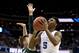 WASHINGTON, DC - MARCH 31: RJ Barrett #5 of the Duke Blue Devils attempts a shot against Matt McQuaid #20 of the Michigan State Spartans during the second half in the East Regional game of the 2019 NCAA Men's Basketball Tournament at Capital One Arena on