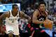 MILWAUKEE, WISCONSIN - MAY 15: Kyle Lowry #7 of the Toronto Raptors dribbles the ball while being guarded by Eric Bledsoe #6 of the Milwaukee Bucks in the first quarter in Game One of the Eastern Conference Finals of the 2019 NBA Playoffs at the Fiserv F