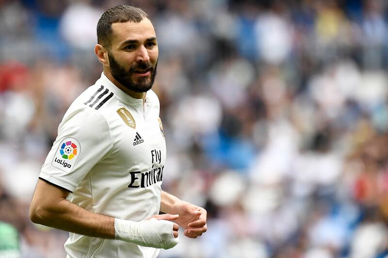 Real Madrid's French forward Karim Benzema runs during the Spanish League football match between Real Madrid and Real Betis at the Santiago Bernabeu stadium in Madrid on May 19, 2019. (Photo by PIERRE-PHILIPPE MARCOU / AFP) (Photo credit should rea