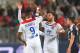 Lyon's French forward Moussa Dembele (L) and Lyon's Dutch forward Memphis Depay (C) celebrate at the end of the French L1 football match between Bordeaux (FCGB) and Lyon (OL) on April 26, 2019 at the Matmut Atlantique stadium in Bordeaux, southwestern Fra