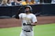 SAN DIEGO, CA - MAY 18: Josh Bell #55 of the Pittsburgh Pirates points skyward after hitting a solo home run during the second inning of a baseball game against the San Diego Padres at Petco Park May 18, 2019 in San Diego, California. (Photo by Denis Por