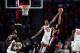 ATHENS, GEORGIA - FEBRUARY 09: Nicolas Claxton #33 of the Georgia Bulldogs blocks the shot of Breein Tyree #4 of the Mississippi Rebels at Stegeman Coliseum on February 09, 2019 in Athens, Georgia. (Photo by Logan Riely/Getty Images)
