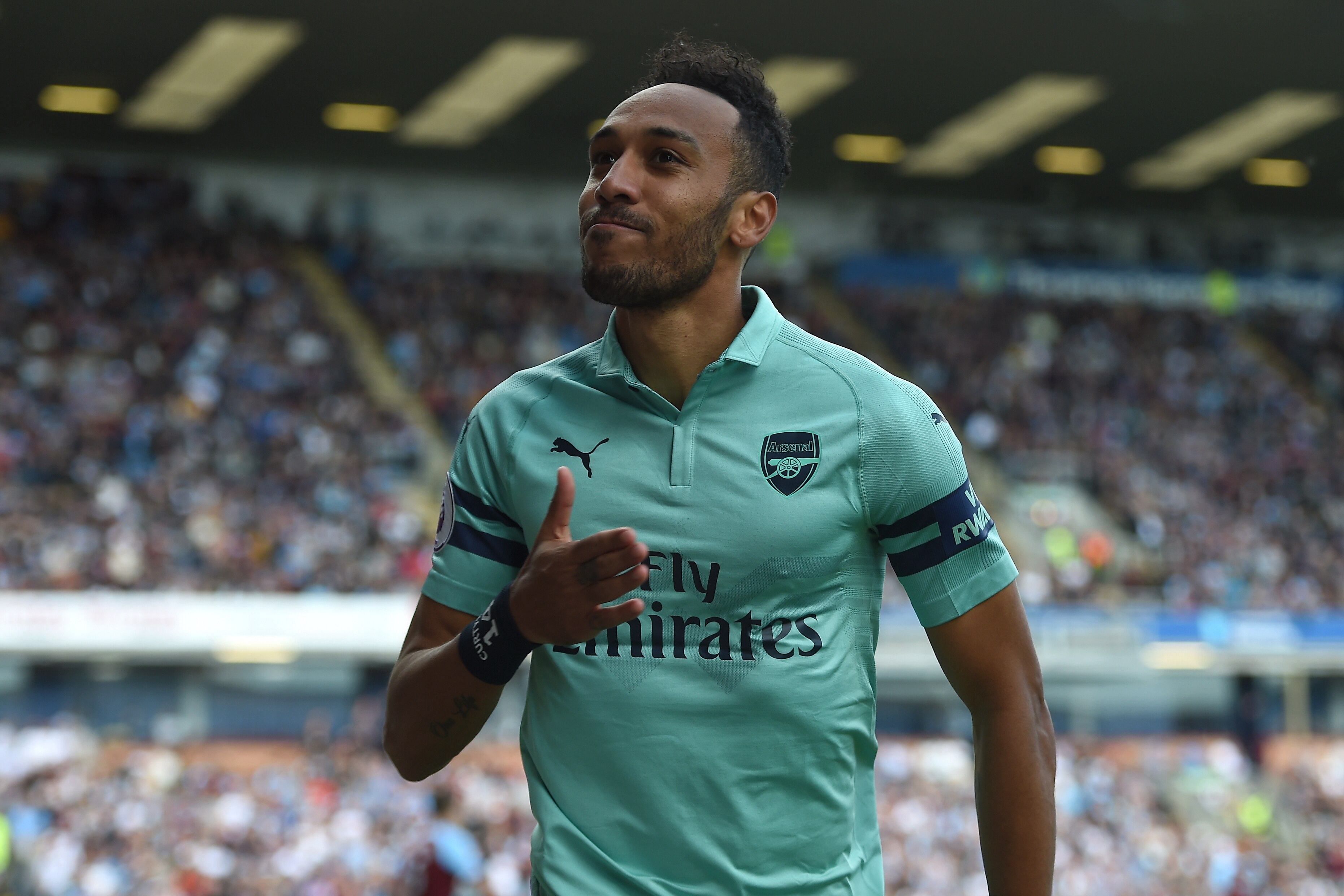 BURNLEY, ENGLAND - MAY 12: Pierre-Emerick Aubameyang of Arsenal celebrates after scoring his team's first goal during the Premier League match between Burnley FC and Arsenal FC at Turf Moor on May 12, 2019 in Burnley, United Kingdom. (Photo by Harriet Lan