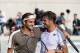 PARIS, FRANCE - JUNE 4: Roger Federer of Switzerland embraces Stan Wawrinka of Switzerland at the net after his quarter finals win on Day Ten at the French Open held at Roland Garros on June 4, 2019 in Paris, France (Photo by Peter Staples/ATP Tour)