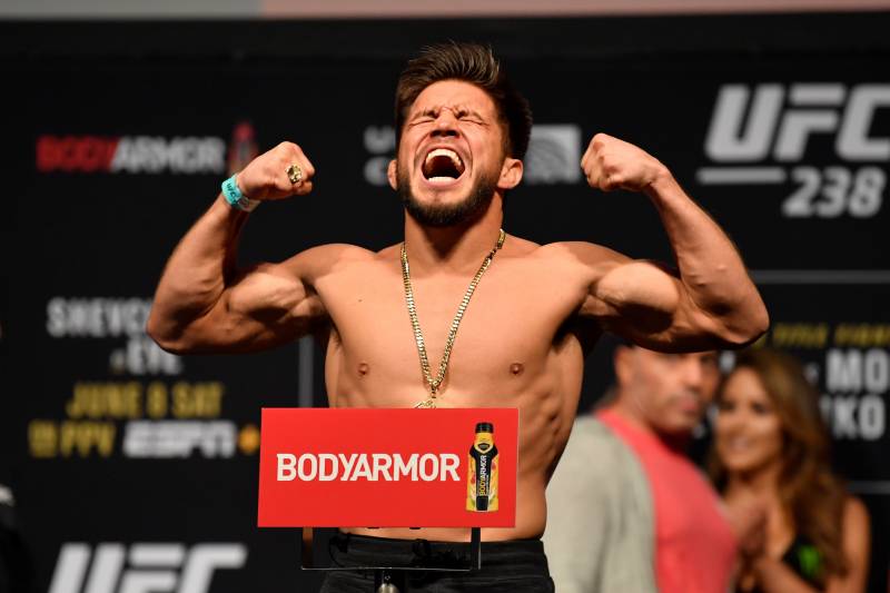 CHICAGO, IL - JUNE 07:  Henry Cejudo poses on the scale during the UFC 238 weigh-in at the United Center on June 7, 2019 in Chicago, Illinois. (Photo by Jeff Bottari/Zuffa LLC/Zuffa LLC via Getty Images)